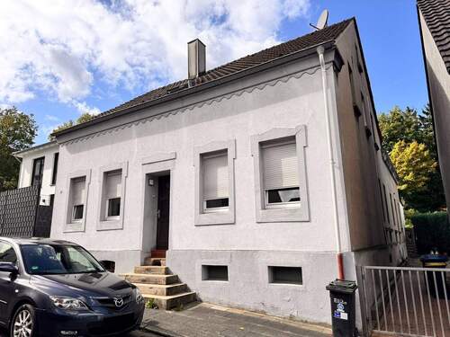 Seitenansicht - Dreifamilienhaus in Broich mit separaten Eingängen