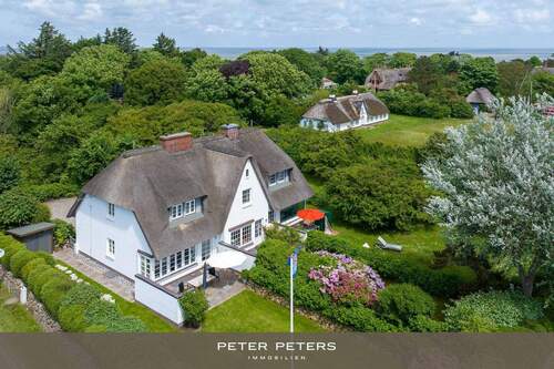 Bild 1 - Charmantes reetgedecktes Mittelhausteil unweit der Braderuper Heide