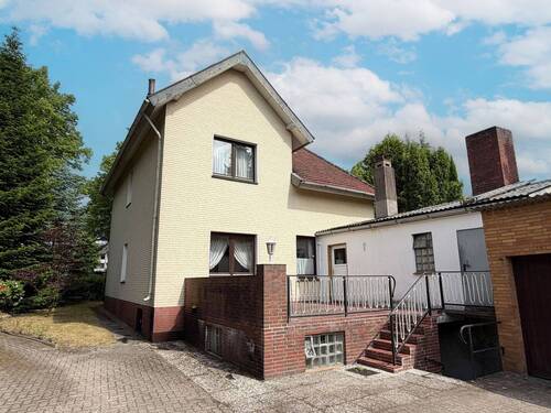 Rückwärtige Hausansicht - 6 Zimmer Einfamilienhaus zum Kaufen in Tornesch