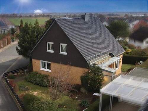 Seitenansicht - 5 Zimmer Einfamilienhaus zum Kaufen in Springe