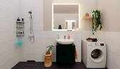 Badezimmer mit Dusche und Waschmaschinenanschluss - 