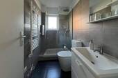 24409031_2-Badezimmer.jpg - Etagenwohnung mit 50,00 m&sup2; in Brodersby zum Kaufen