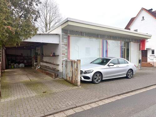 Gewerbeeinheit mit Stellplätzen - 