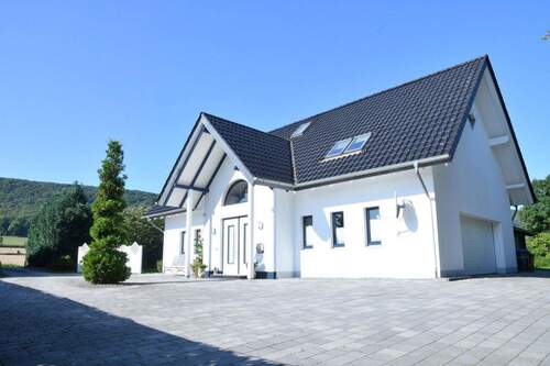 Bild 2 - 5 Zimmer Einfamilienhaus zum Kaufen in Coppenbrügge