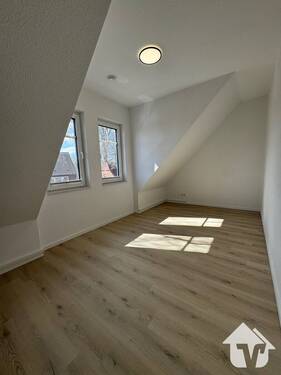 Schlafzimmer 2 - Moderne 3-Zimmer-Wohnung mit Balkon in zentraler Lage von Esterwegen
