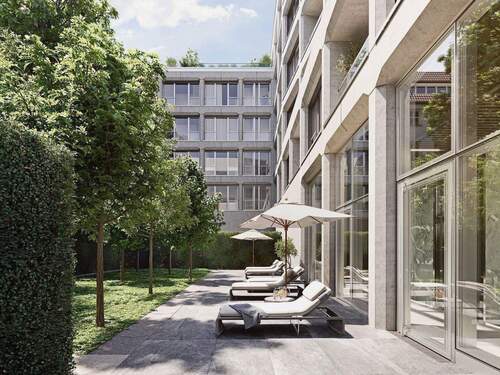 SUITES AM TACHELES Ruhebereich Innenhof.jpeg - 