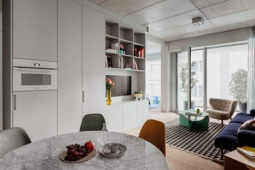 AT_Musterwohnung Suites_Esszimmer und Wohnzimmer_1 - 