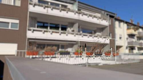 Rückansicht - Zentral wohnen in Dinslaken - 3,5-Zimmer-Eigentumswohnung mit Balkon & Garage