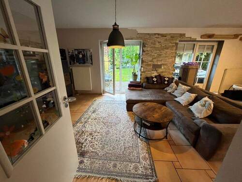 Wohnzimmer - Doppelhaushälfte mit 135,00 m² in Hettenshausen zum Kaufen