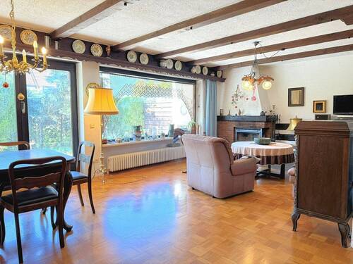 Wohnzimmer mit Zugang zur Terrasse - 