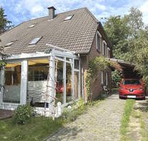 PURNHAGEN-IMMOBILIEN - Gepflegte Doppelhaushälfte mit Carport in ruhiger Lage von Bremen - Farge - Bremen / Farge