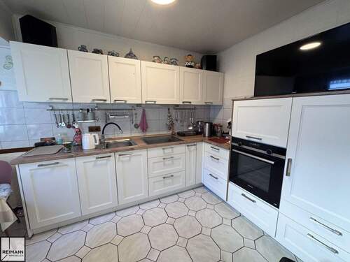 Küche mit Einbauküche - 