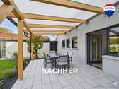 RE/MAX Immobilien DeLux Soppelhaushälfte Mettlach Terrasse nachher - 
