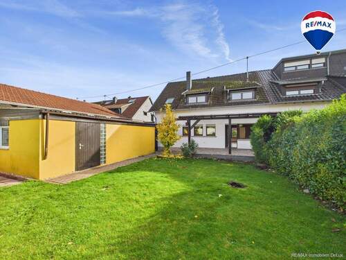 RE/MAX Immobilien DeLux Soppelhaushälfte Mettlach Garten - 