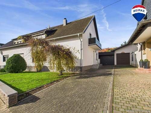 RE/MAX Immobilien DeLux Soppelhaushälfte Mettlach - 6 Zimmer Einfamilienhaus zum Kaufen in Mettlach