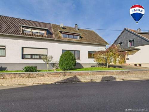 RE/MAX Immobilien DeLux Soppelhaushälfte Mettlach - 6 Zimmer Einfamilienhaus in Mettlach