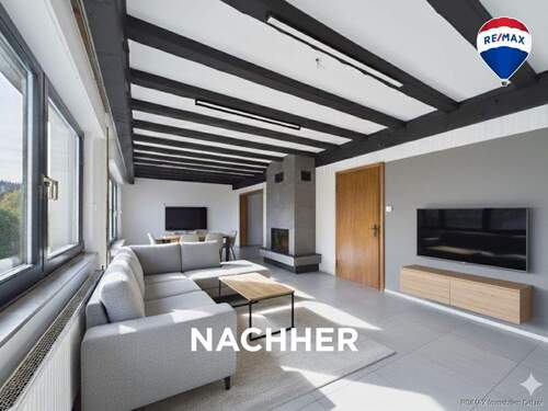 RE/MAX Immobilien DeLux Soppelhaushälfte Mettlach Wohnzimmer nachher - 