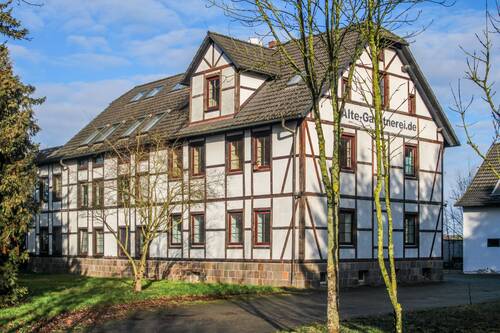Gebäudeansicht - GROßES GRUNDSTÜCK, VIELE MÖGLICHKEITEN Mehrfamilienhaus in Mockrehna mit Landwirtschaftsfläche