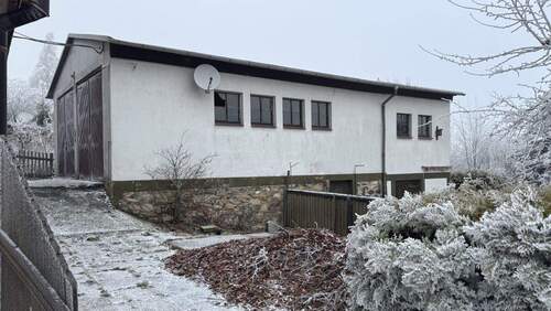 Seitenansicht Doppelgarage/Nebengelass - 