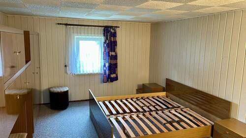Schlafzimmer im Dachgeschoss - 