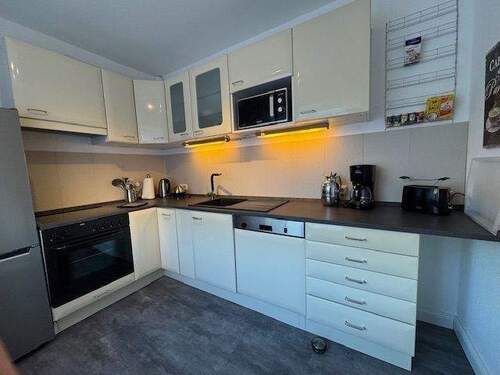 Küche mit Einbauküche - 