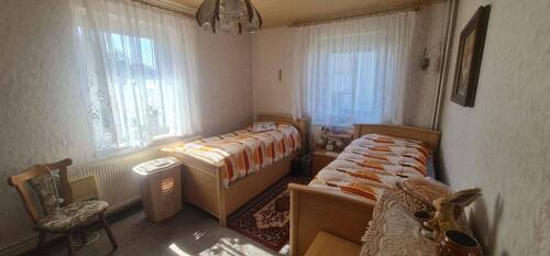 Schlafzimmer im Erdgeschoss - 