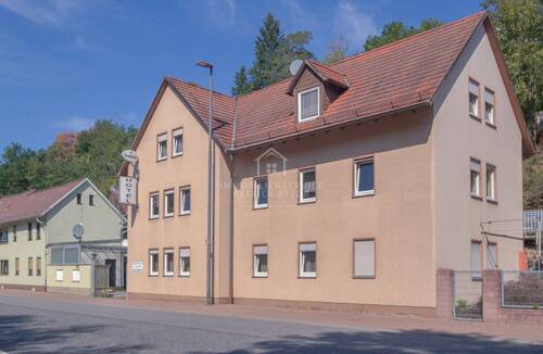 Motel Aussen - 2 Zimmer Mehrfamilienhaus, Wohnhaus zum Kaufen in Ober-Mörlen