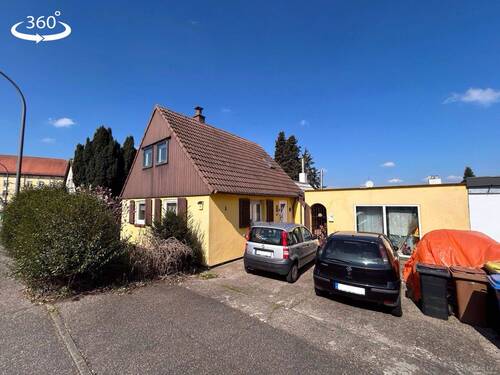 25-MRBD-110 - Sanierungsbedürftiges Einfamilienhaus mit gewerblichem Anbau