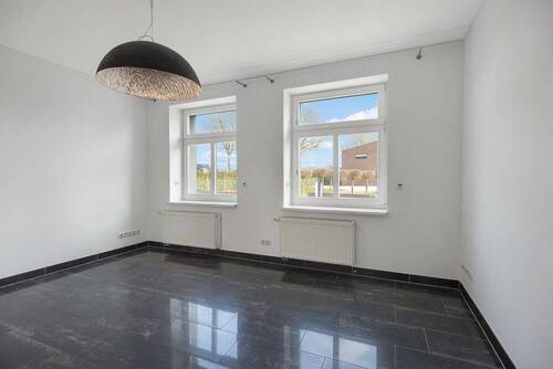Wohnzimmer - Reihenendhaus mit 180,00 m² in Mönchengladbach zum Kaufen