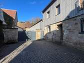 Vorderhaus mit Tor zum Hof - 