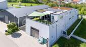 Außenansicht Halle 1 - All-in-One: Arbeiten, Wohnen & Wachsen . Zwei Lagerhallen mit gehobener Betriebswohnung