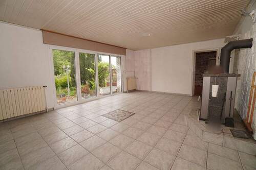 Wohnzimmer EG - Mehrfamilienhaus, Wohnhaus mit 149,00 m² in Gütersloh / Hollen zum Kaufen