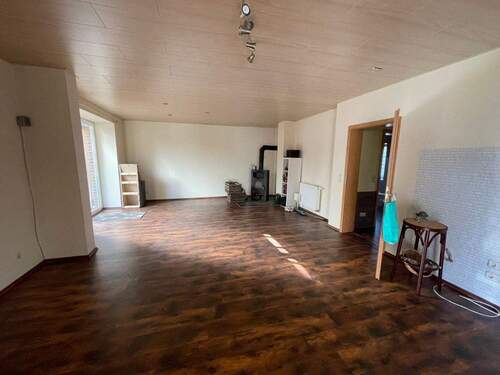 Wohnbereich mit Kamin - Einfamilienhaus mit 172,00 m&sup2; in Schneverdingen zum Kaufen