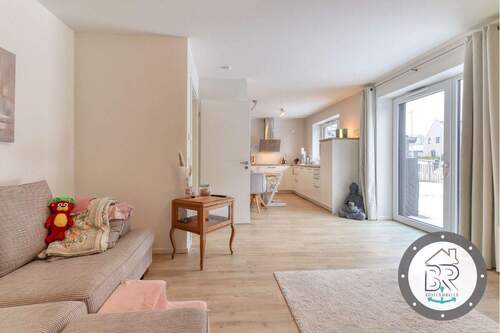 Herzstück des Hauses – offener Wohnbereich mit Terrassenzugang - 