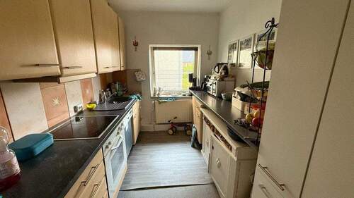 Küche mit Einbauchküche - 