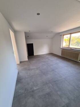 Wohnzimmer - 1 Zimmer Mehrfamilienhaus, Wohnhaus zum Kaufen in Steinheim