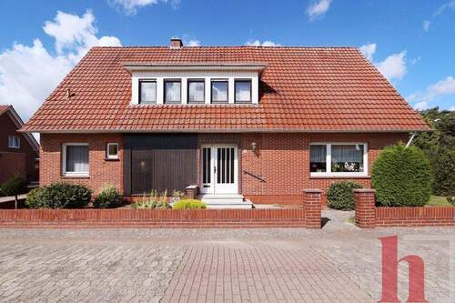 Frontansicht - 7 Zimmer Einfamilienhaus zum Kaufen in Holdorf