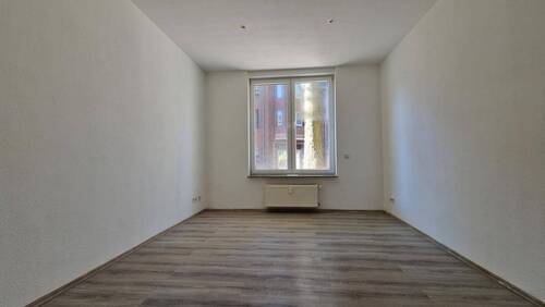 Wohnzimmer (EG rechts) - Mehrfamilienhaus, Wohnhaus mit 256,30 m² in Oberhausen zum Kaufen