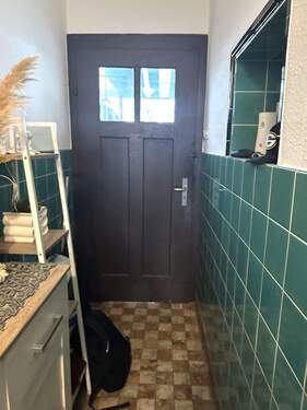 Durchgang zum Garten vom Eingang - 