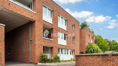 Außenansicht 1 - Helle 2-Zimmer-Etagenwohnung mit Loggia und Tiefgaragenstellplatz