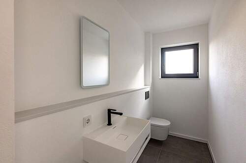 Gäste WC / Musterhaus - Doppelhaushälfte mit 154,00 m&sup2; in Gerolfing zum Kaufen