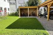Garten mit Fahrradschuppen der DG-Mieter - 