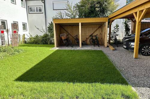 Garten mit Fahrradschuppen der DG-Mieter - 