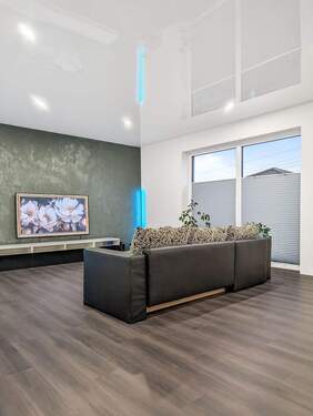 Haus 1 Wohnzimmer - Werz Immobilien - 