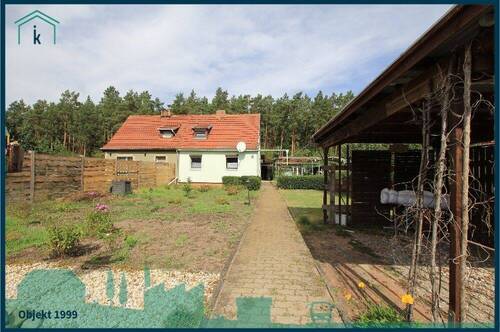 1999 Blick übers Grundstück zum Haus.jpg - Mehrfamilienhaus, Wohnhaus mit 86,00 m² in Am Mellensee zum Kaufen