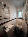 Toilette mit Dusche - 
