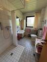 EG_behg. Bad mit ebenerdiger Dusche - 