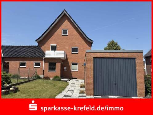 Außenansicht - Doppelhaushälfte mit Garage - 220.000,00 EUR Kaufpreis, ca.  120,00 m² Wohnfläche