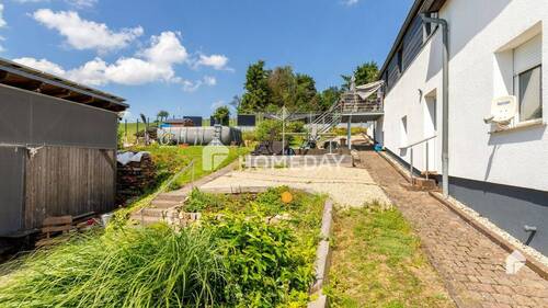 Garten 1 - 8 Zimmer Einfamilienhaus in Schillingen