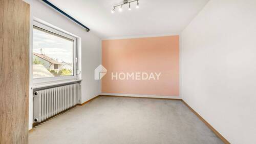 1. OG Schlafzimmer 1 - 